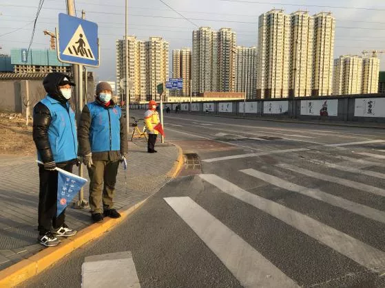 “迎冬奥 保畅通”丰台志愿者扮靓文明交通示范路口