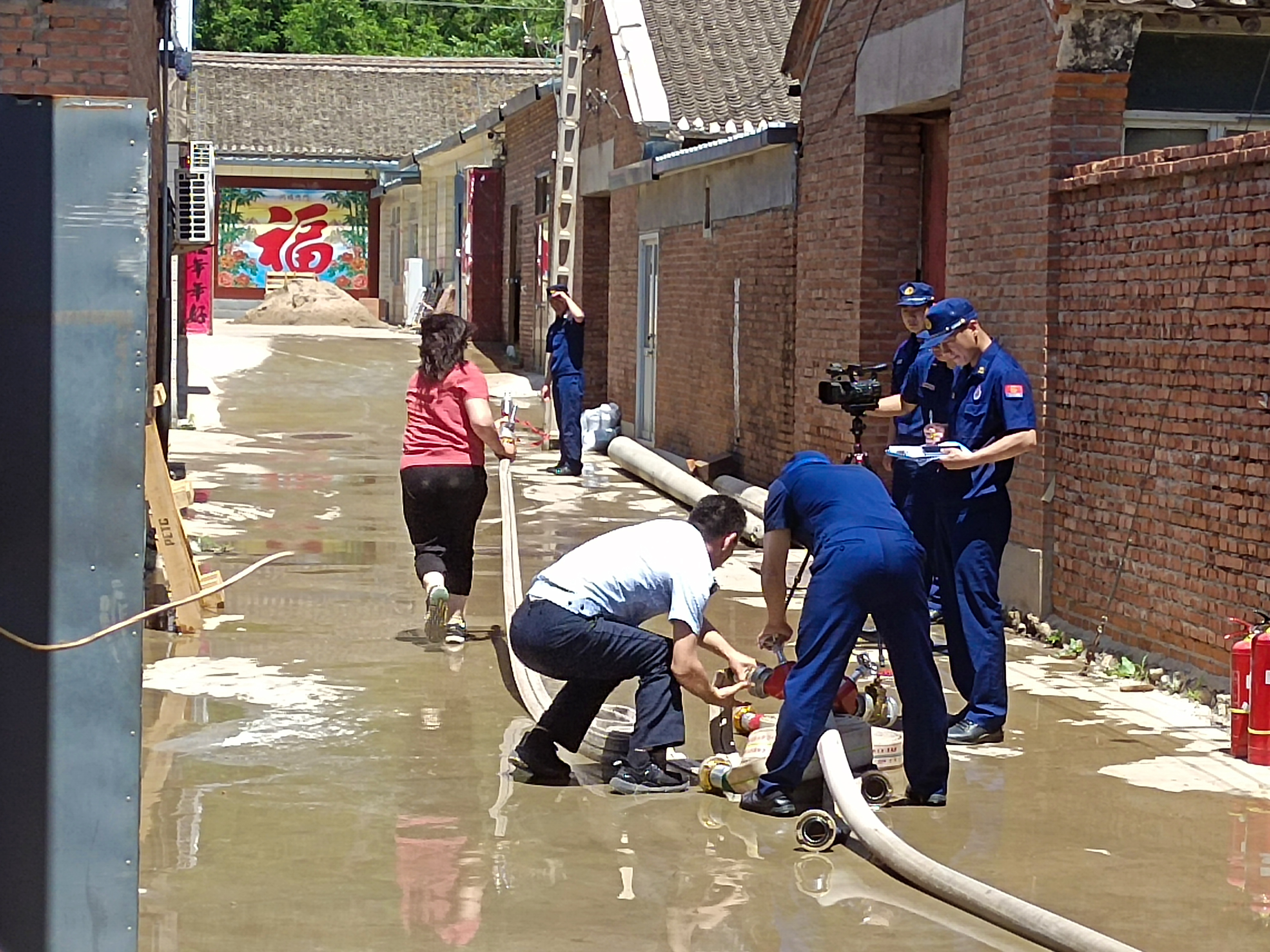 密云区新城子镇开展“一警六员”消防演练