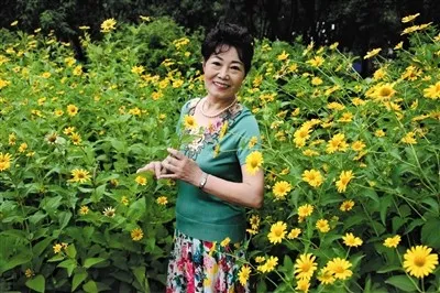 幸福东城 | “元老级”参与者两年坚持扮靓美丽街巷