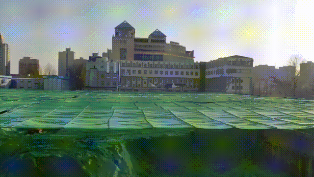 有效防尘！东城工地启用“天幕系统”