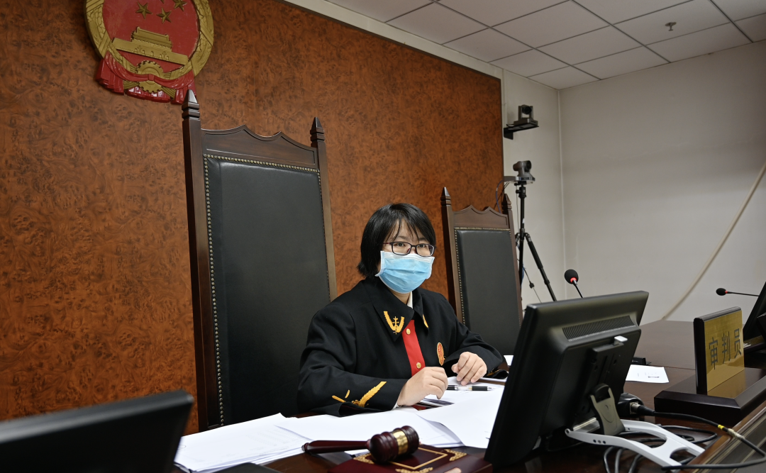 聋哑人听得见的“慢庭审”